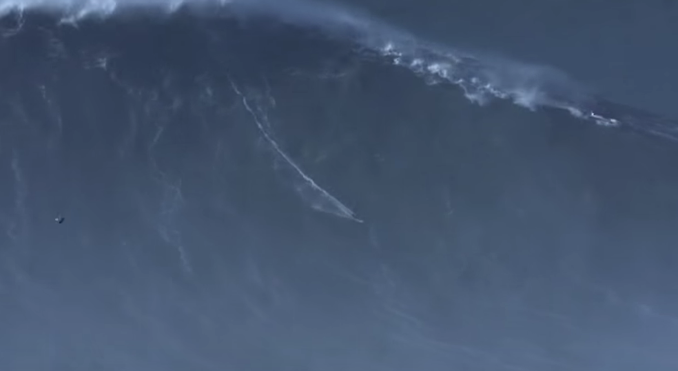 Brazil's Rodrigo Koxa surfs the biggest wave on record