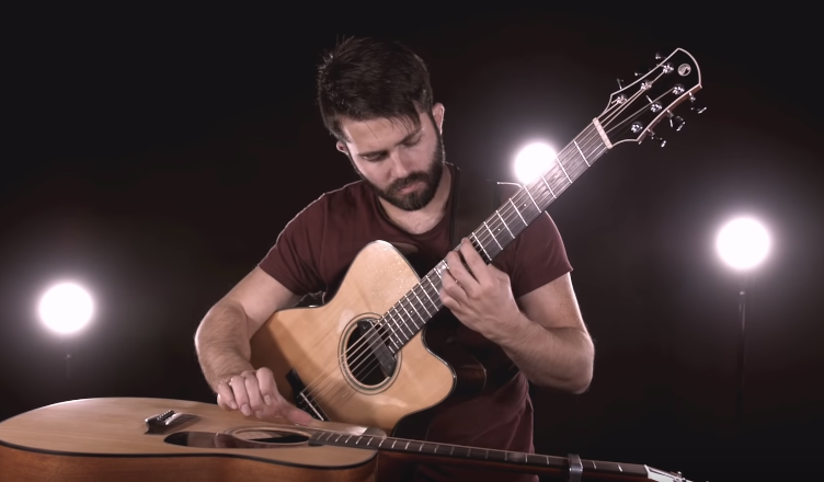 Watch this guy play Michael Jackon's "Thriller" on two guitars