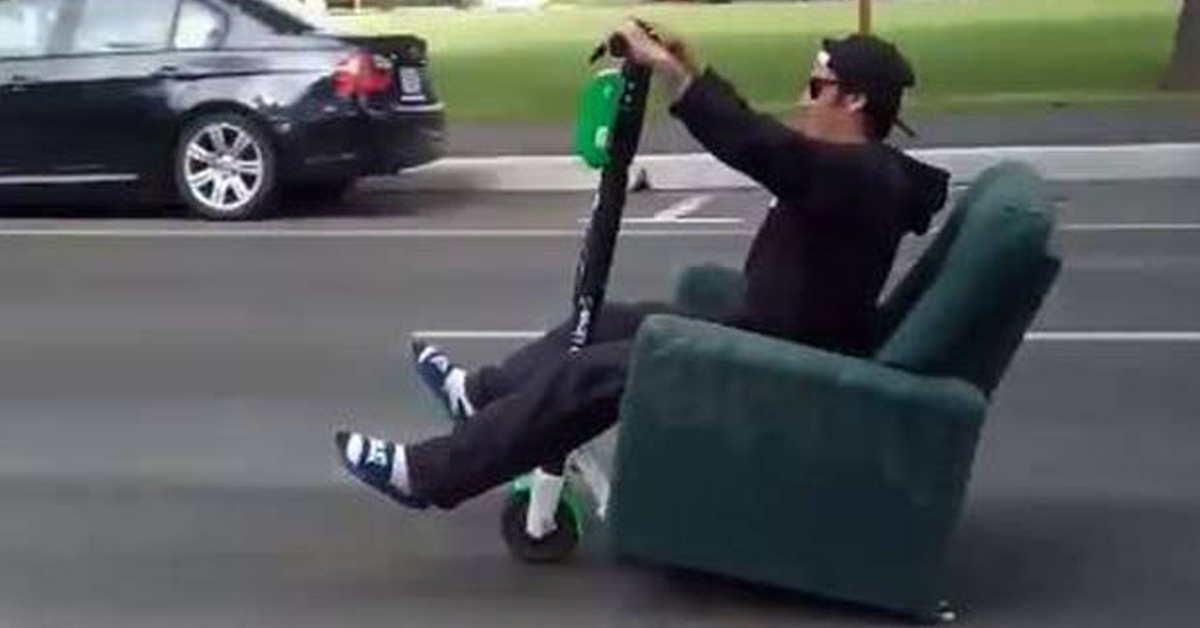Watch a Dunedin man ride a Lime Scooter on a La-Z-Boy