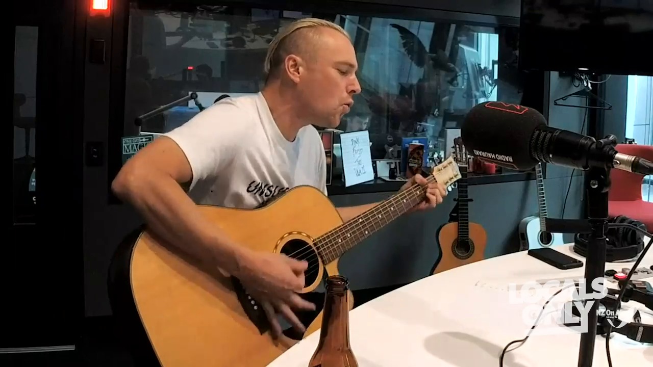 Watch Neil Fraser perform "Raised In The Dark" live