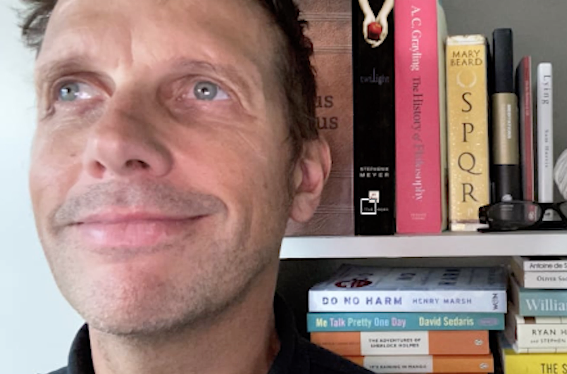 Matt snapped with 'Twilight' book on his bookshelf