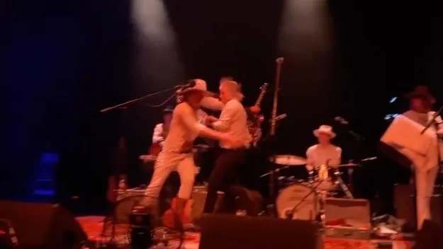 The Brian Jonestown Massacre frontman Anton Newcombe and guitarist Ryan Van Kriedt brawl on stage