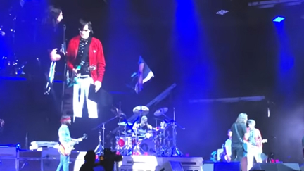 Watch Rivers Cuomo join the Foo Fighters to cover "Detroit Rock City" by Kiss