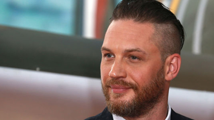 Watch Tom Hardy talk to his dog as Bane