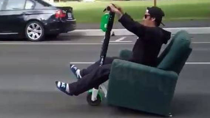 Watch a Dunedin man ride a Lime Scooter on a La-Z-Boy