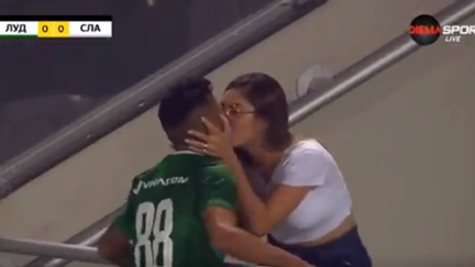 Soccer players scores goal, jumps into crowd to kisses his BOFA wife, goal gets disallowed
