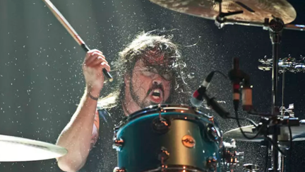 10-year-old prodigy Nandi Bushell challenges Dave Grohl to "a drum battle"