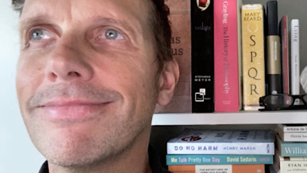 Matt snapped with 'Twilight' book on his bookshelf