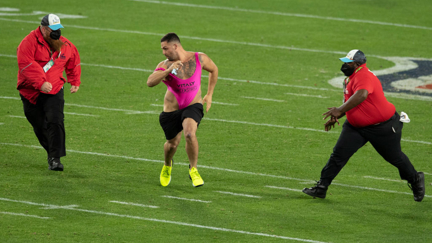 Please enjoy the greatest commentary of a streaker ever!