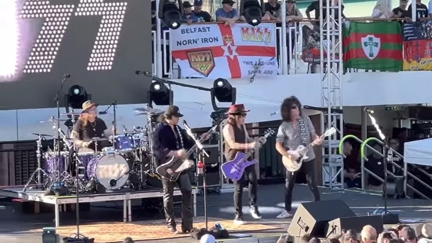 WATCH: Kiss Perform Without Their Stage Make-Up & Costumes...