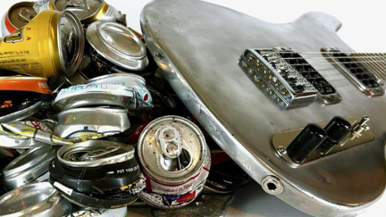 WATCH: This Guy Melts 1000 Cans Into A Guitar