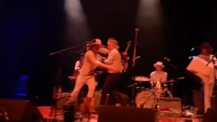 The Brian Jonestown Massacre frontman Anton Newcombe and guitarist Ryan Van Kriedt brawl on stage