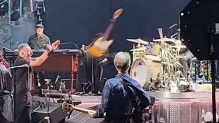 WATCH: Bruce Springsteen launches his Telecaster across the stage and accidentally hits his guitar tech in the head