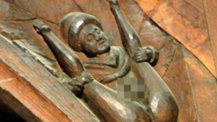 Carpenter's 800-year-old rude carving found hidden in English church ceiling